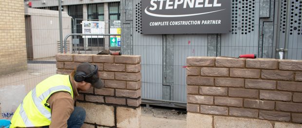 Josh Jackson, a L2 student at New College Swindon, demonstrates his bricklaying skills by building brick wall samples