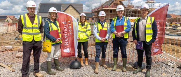 Brian Mathew MP enjoying a tour of Newland Homes’ zero carbon homes at St George’s Mead in Semington. (From left to right) Rhys Capstaff-Taylor from Newland
