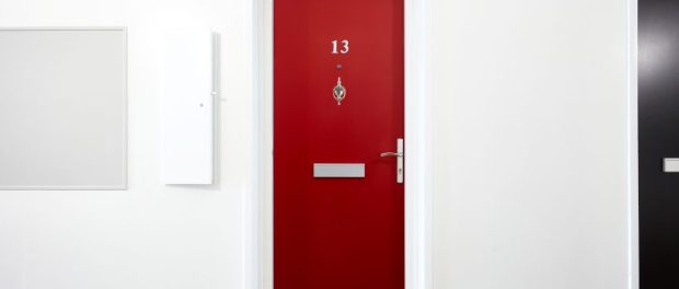 red door with knocker